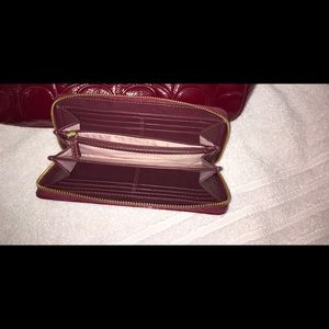Coach embossed burgundy bag with matching wallet